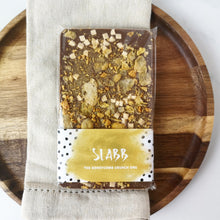 Load image into Gallery viewer, The Honeycomb Crunch One - The Home Of Fully Loaded boozy Chocolate. Large Slabbs of boozy chocolate with a variety of alcoholic ganaches; gin, rum, whisky, amaretto, baileys and toppings. Available as monthly subscriptions.