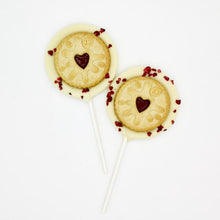 Load image into Gallery viewer, White Chocolate Jammy Dodger Lollipop - The Home Of Fully Loaded boozy Chocolate. Large Slabbs of boozy chocolate with a variety of alcoholic ganaches; gin, rum, whisky, amaretto, baileys and toppings. Available as monthly subscriptions.