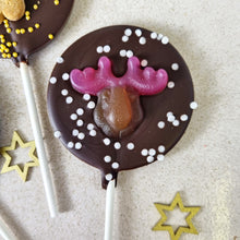 Load image into Gallery viewer, Vegan Dark Chocolate Gummy Reindeer Lollipop.
